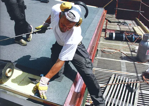 Owner of the roofing business working